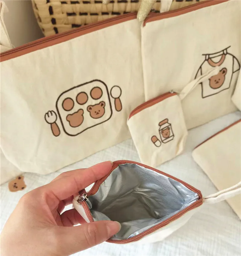 Bolsa organizadora de pañales para bebé con compartimentos - imagen 4
