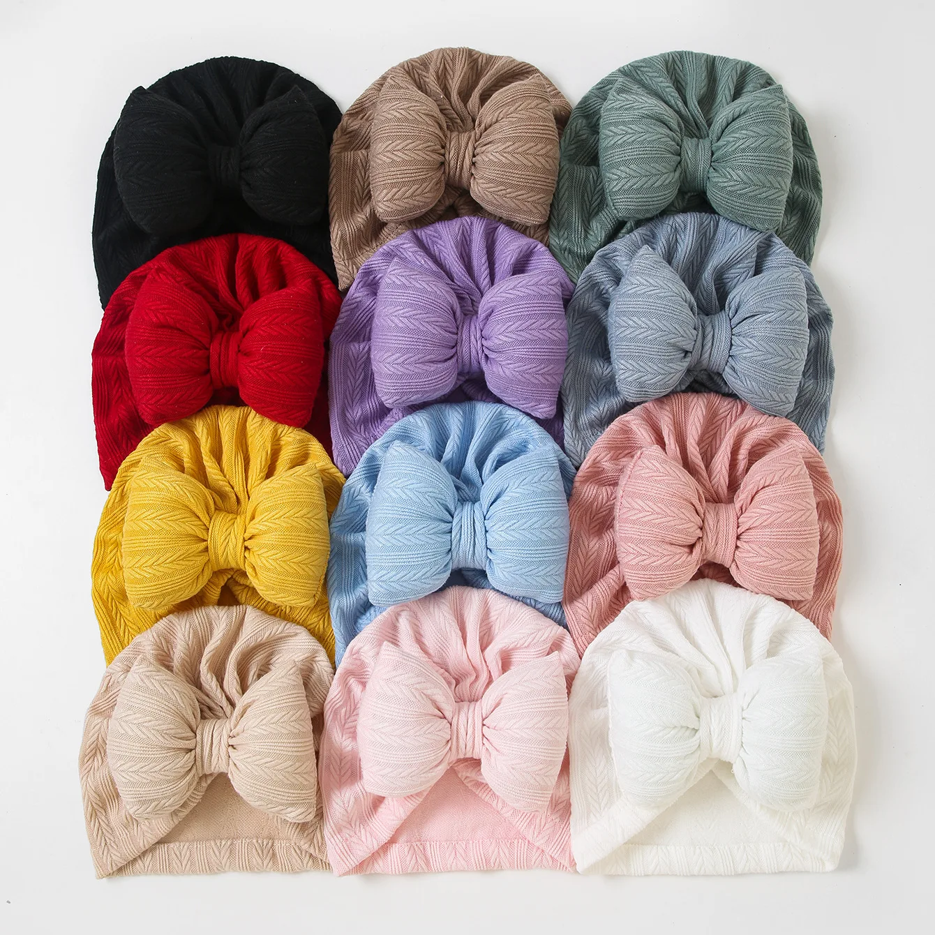 Gorro bebé tejido suave con lazo en la oreja para recién nacido
