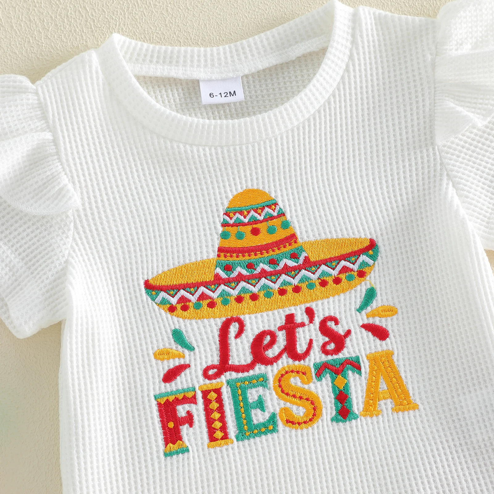 Conjunto verano niña camiseta bordada y pantalón elástico acampanado