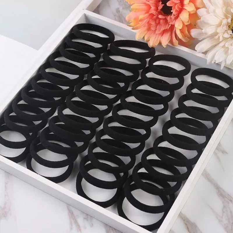 Banda elástica negra para recoger el cabello con comodidad