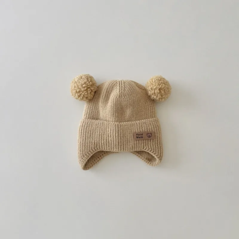 Gorro de bebé con orejeras de lana tejido y animales para invierno - imagen 5