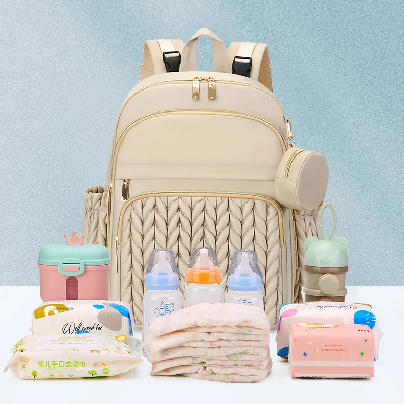 Mochila pañales con cambiador y accesorios para bebé en marcha - imagen 5