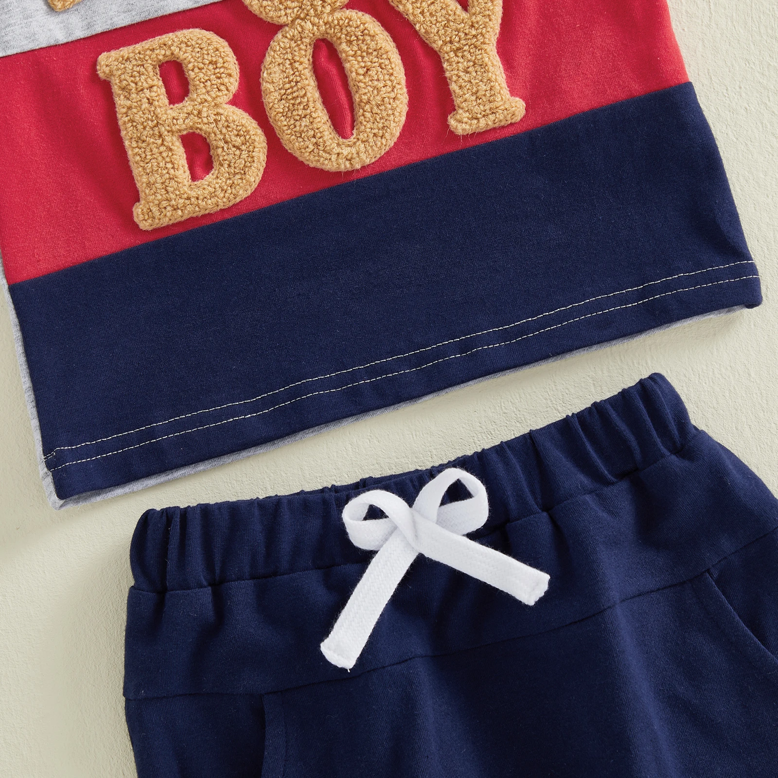 Conjunto bebé camiseta sin mangas y pantalón corto con oso bordado