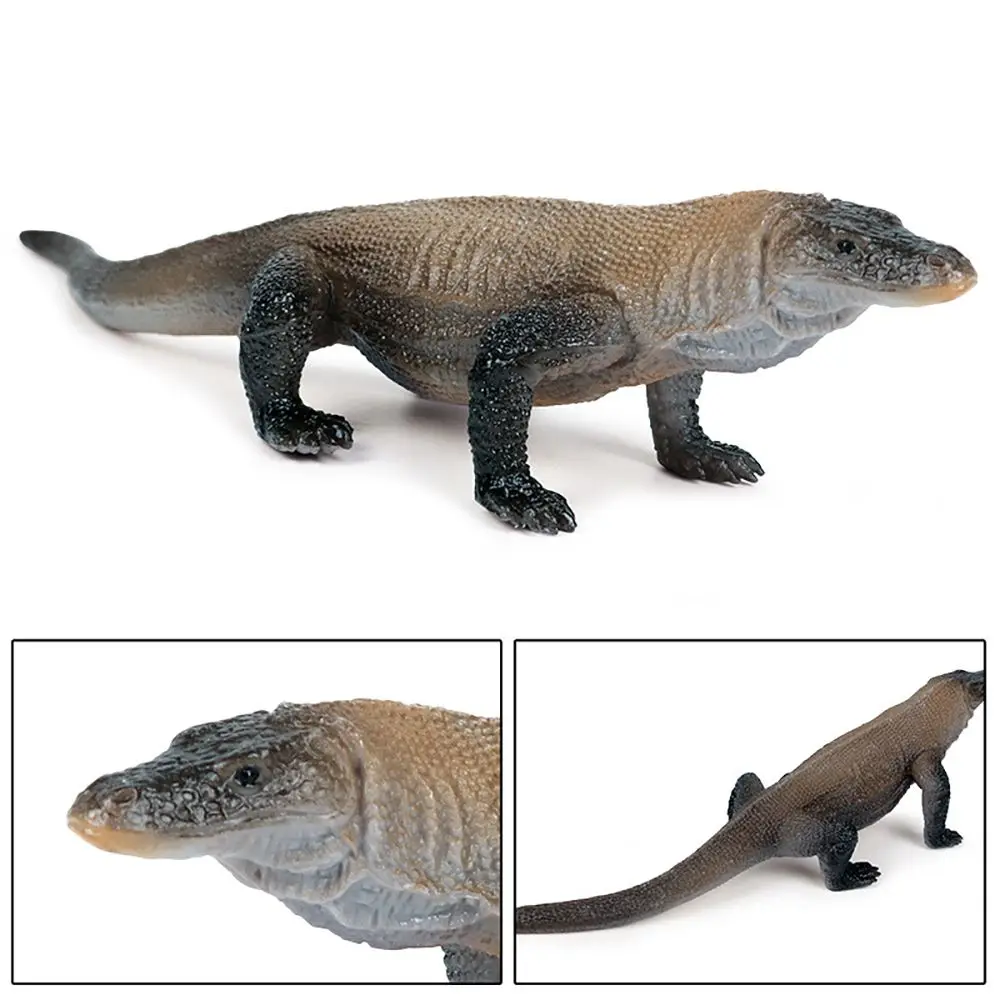 Escena tipo zoológico con figura de lagarto gigante