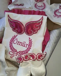 Dollbling salida de hospital recién nacido con bordado al ángel