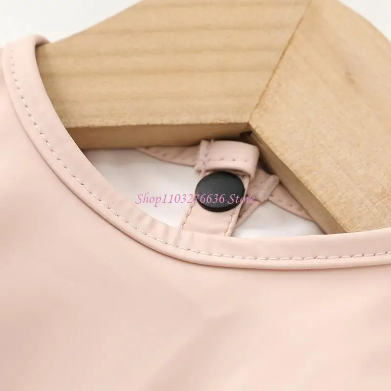 Babero impermeable reutilizable de tela con bolsillo y manga larga
