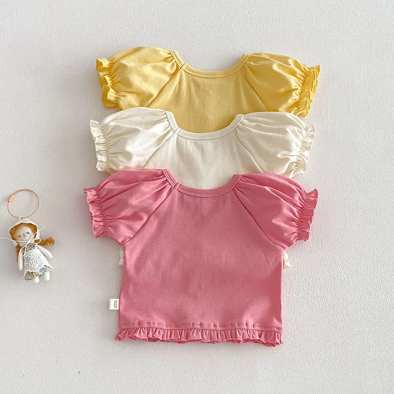 MILANCEL Camiseta de verano niña de color liso con mangas abullonadas