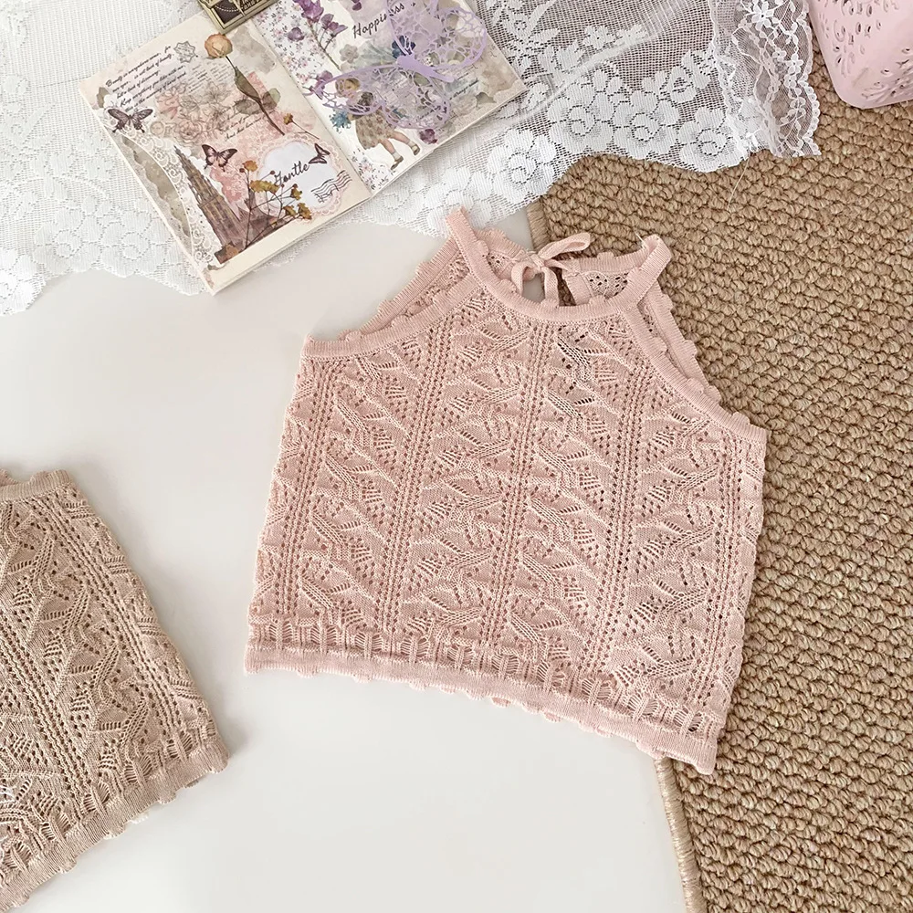 Chaleco de punto para niñas con detalle de cordón