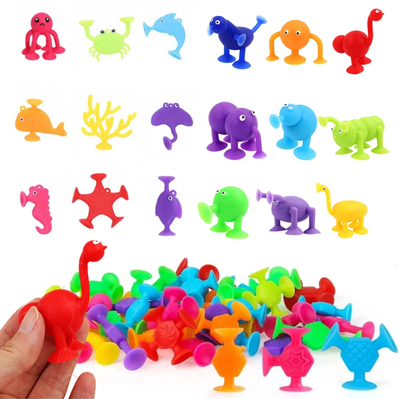 Juguetes de baño con ventosa en silicona suave para bebés