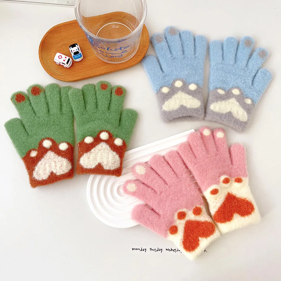 Guantes en uso por niño