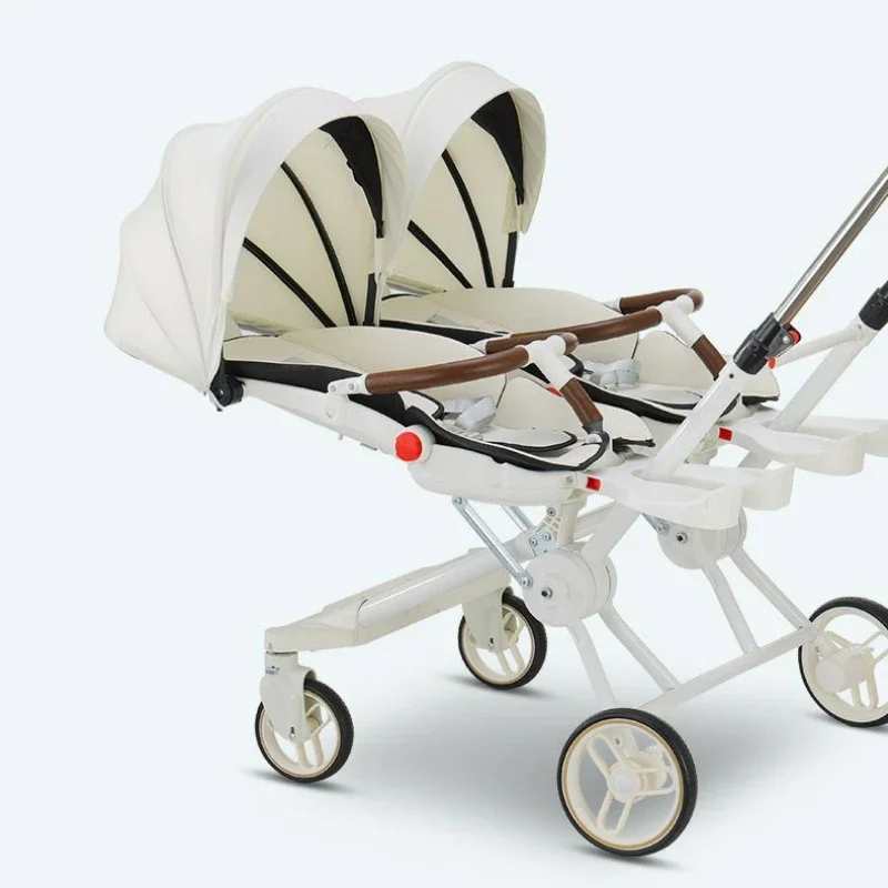 Cochecito gemelar pliable de cuatro ruedas – Cómodo y funcional - imagen 2