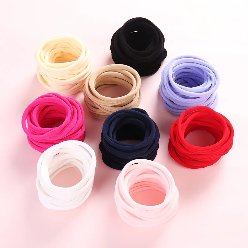 Lote de 50 diademas de nailon suave para niños y niñas en colores sólidos