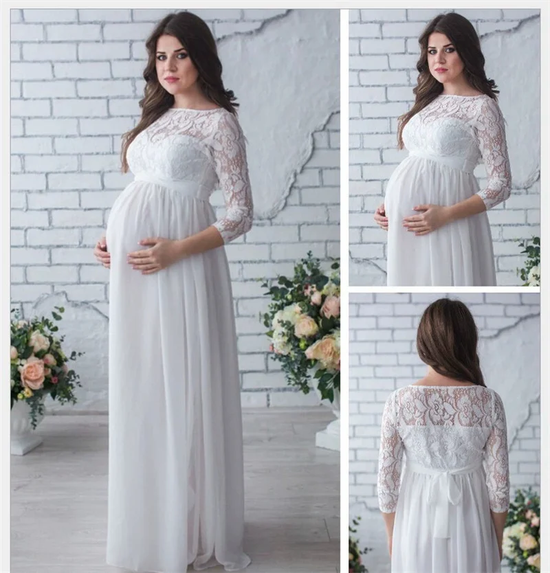 Detalle del encaje y la caída del vestido largo de maternidad