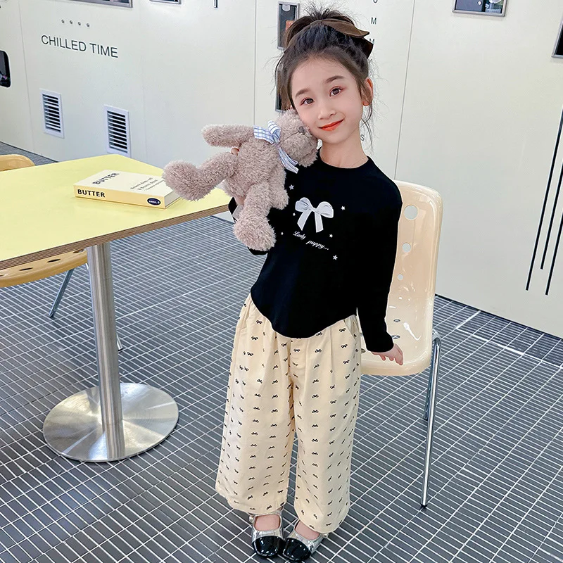 Conjunto niña de blusa con lazo primaveral y pantalón - imagen 5