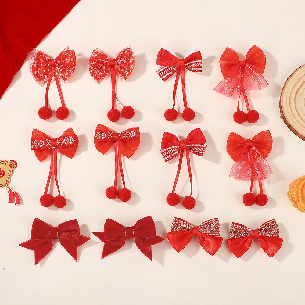 Pinzas con lazo de terciopelo rojo