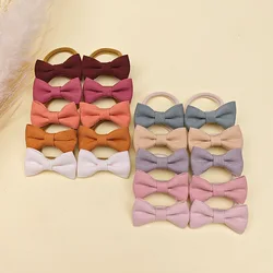 Elásticos de pelo arco suave en algodón y lino para niña