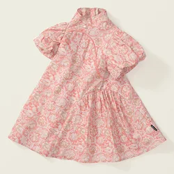Vestido de bebé rosa de algodón con flores y mangas abullonadas