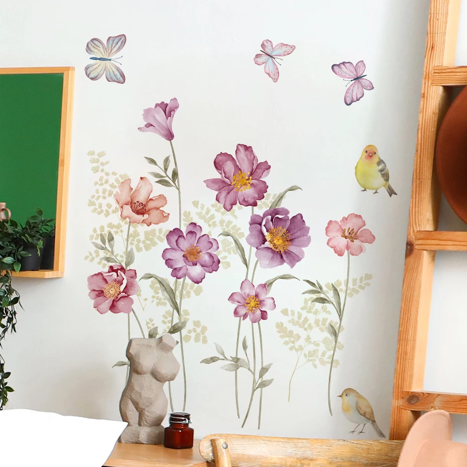 Mariposas y flores estilo acuarela en pared