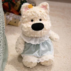 Peluche West Highland White Terrier con accesorios de ropa