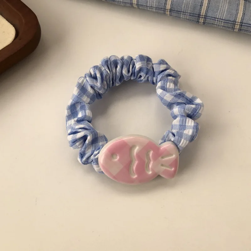 Diadema infantil con estampado de pez y rayas – Color crema - imagen 4