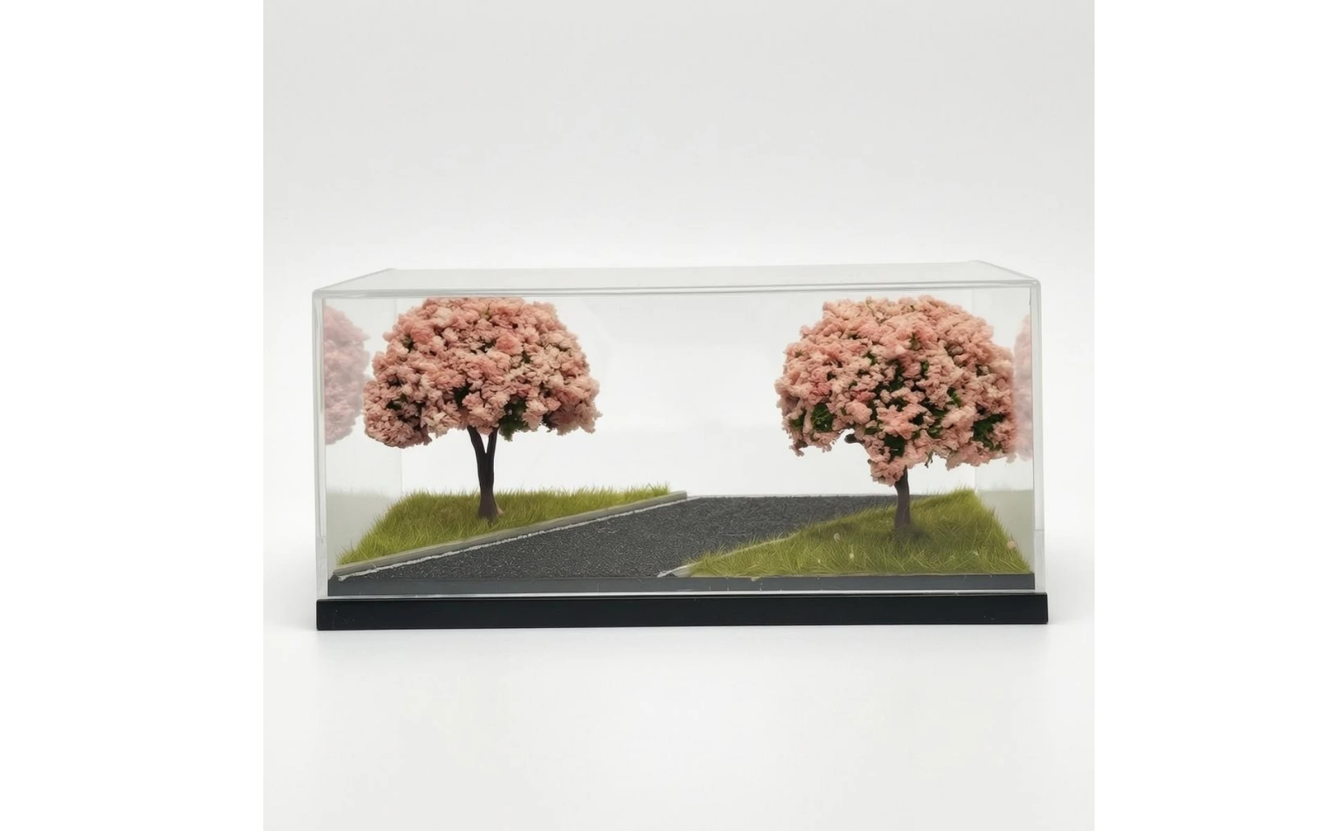 Detalle del diorama con capas de hierba laterales
