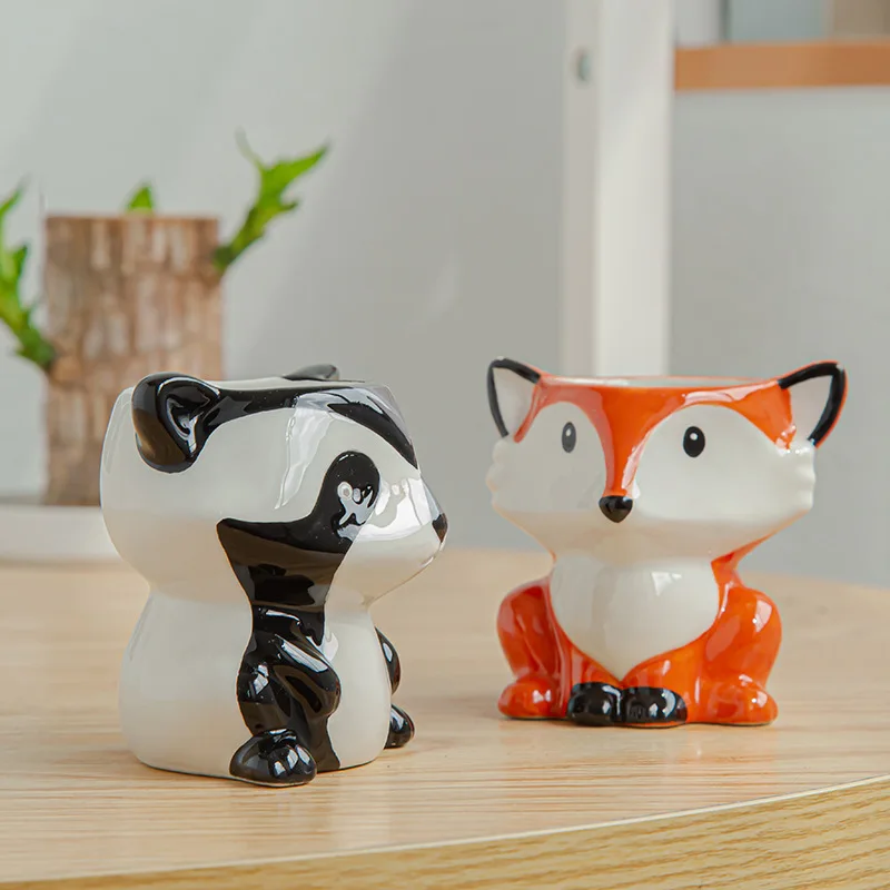 Colección de mini macetas con diferentes diseños de animales