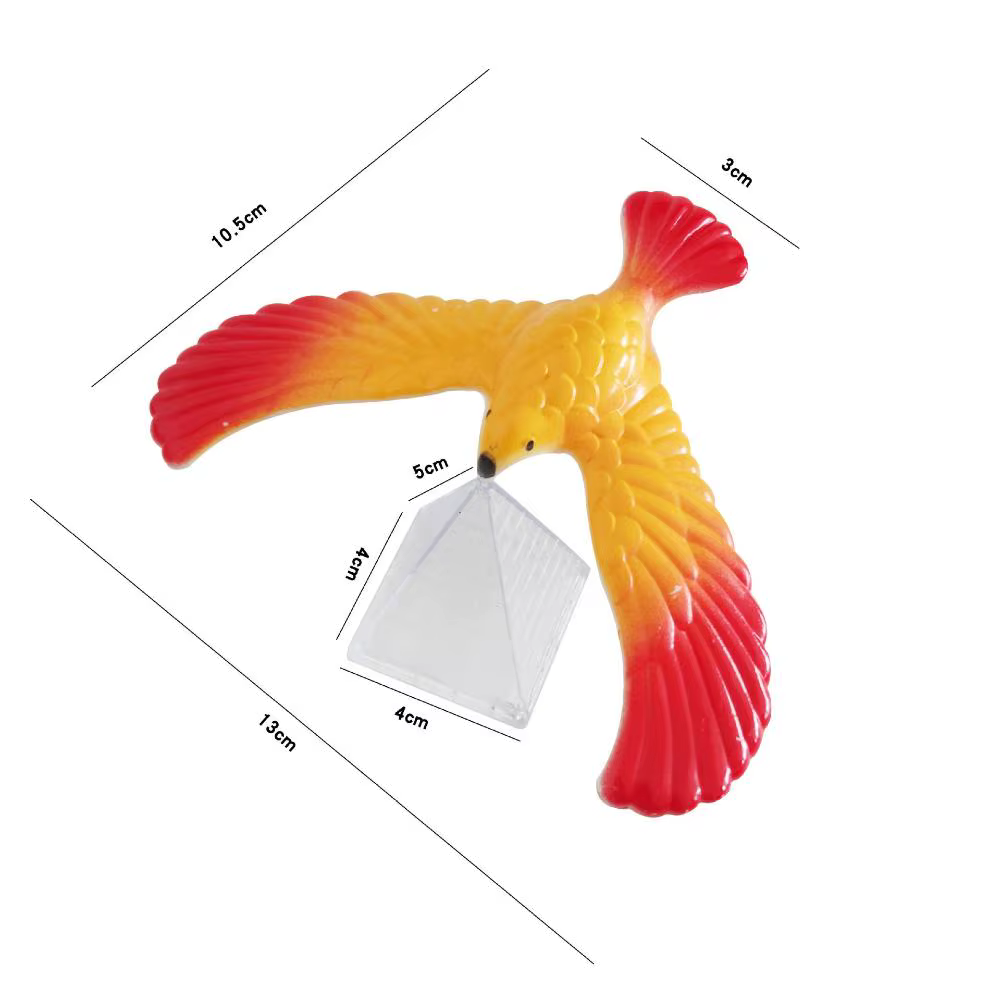 Pájaro de equilibrio sobre base triangular