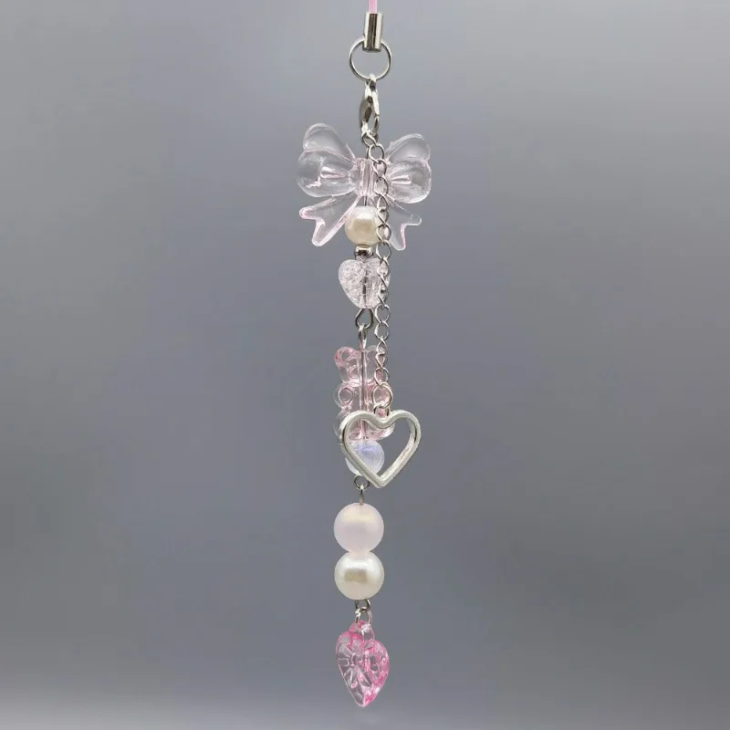 Abalorio para teléfono con lazo plateado rosa y colgante corazón - imagen 4