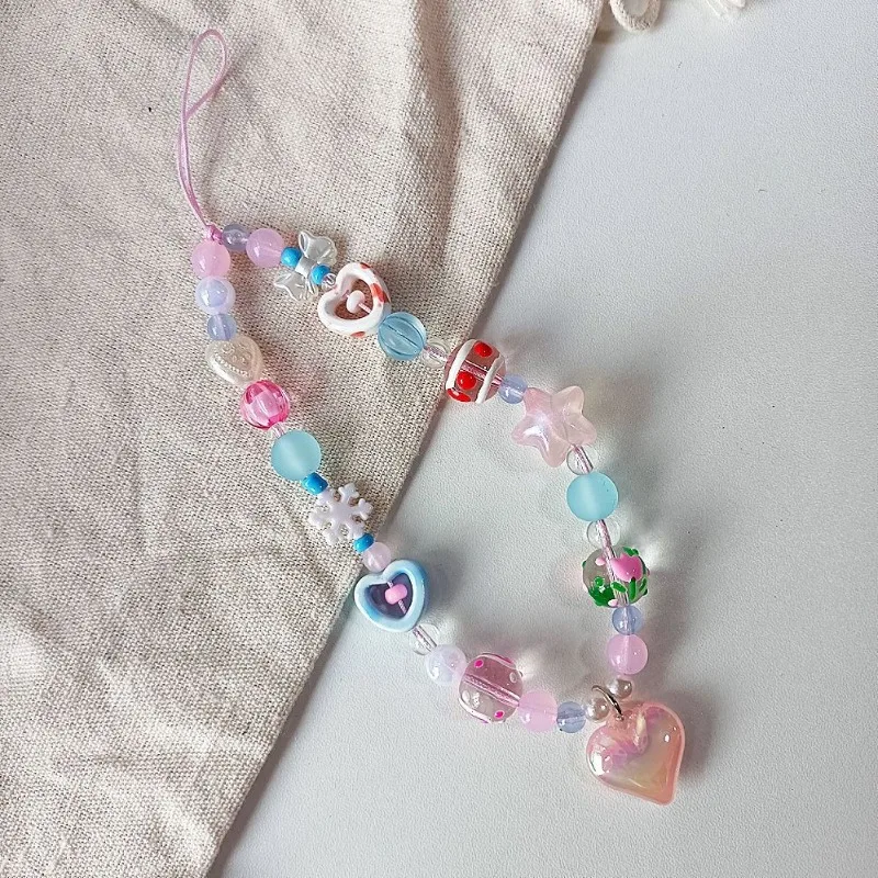 Cordón antipérdida infantil para móvil con corazones - imagen 2