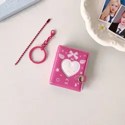 Llavero con mini álbum de fotos mariposa y lazo corazón hueco