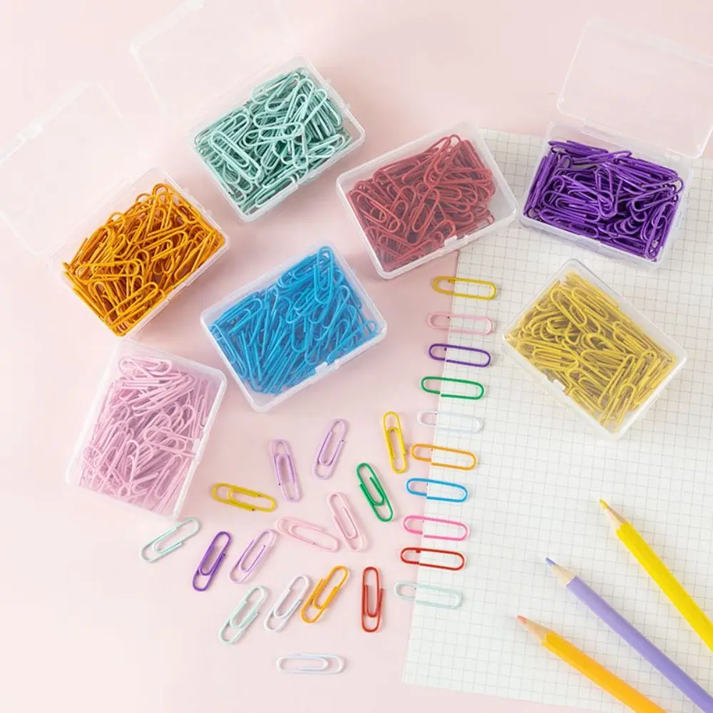 Clips metálicos de encuadernación en colores para archivador
