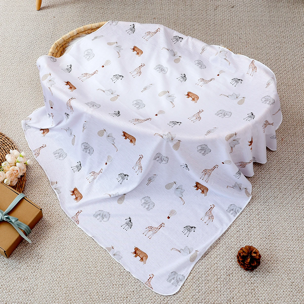 Manta envolvente Kangobaby en uso práctico con bebé