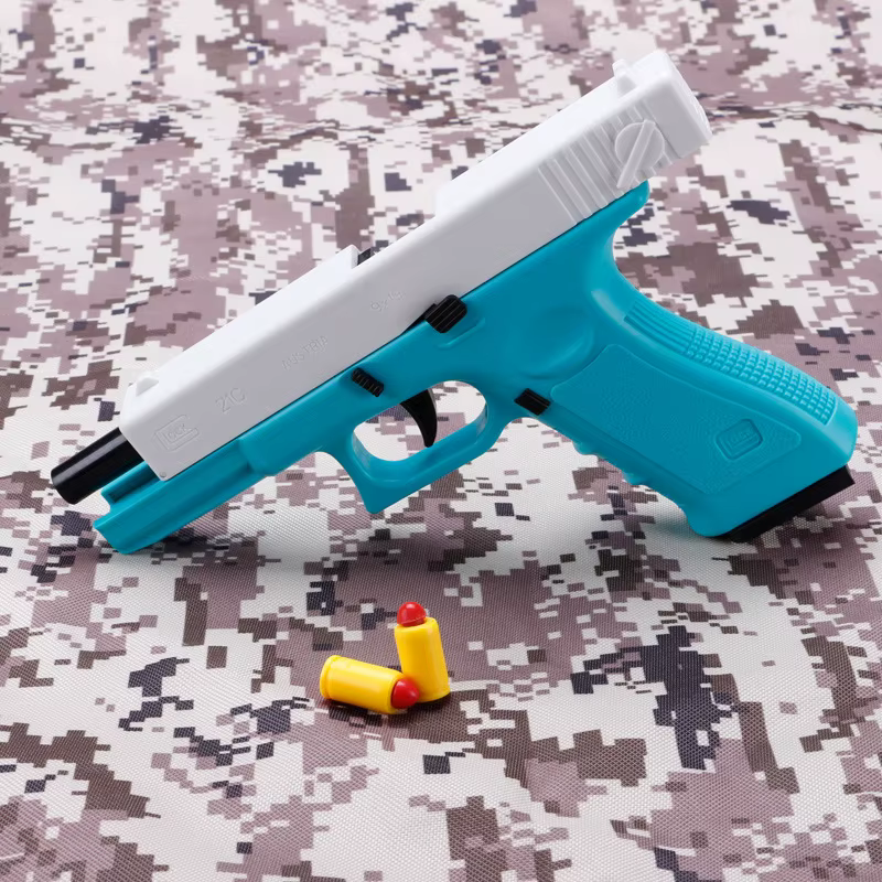Pistola de dardos para niños con retroceso