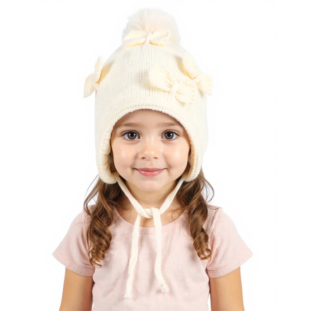 Gorro con orejeras tejido cálido, lazo y pompón para invierno - imagen 3