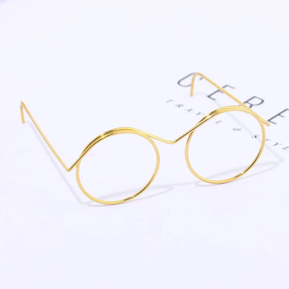 Gafas sobre superficie mostrando el conjunto completo de 10 unidades