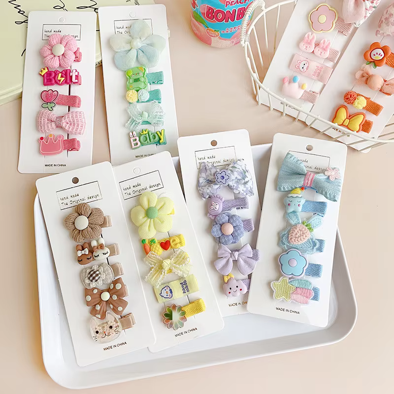Set de horquillas infantiles con diseños variados kawaii