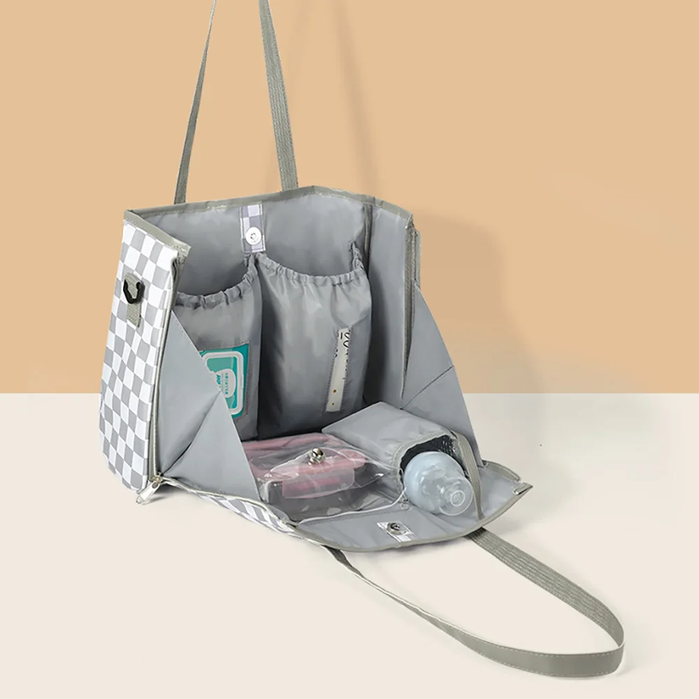 Bolsa de pañales con varios compartimentos y correa ancha - imagen 4