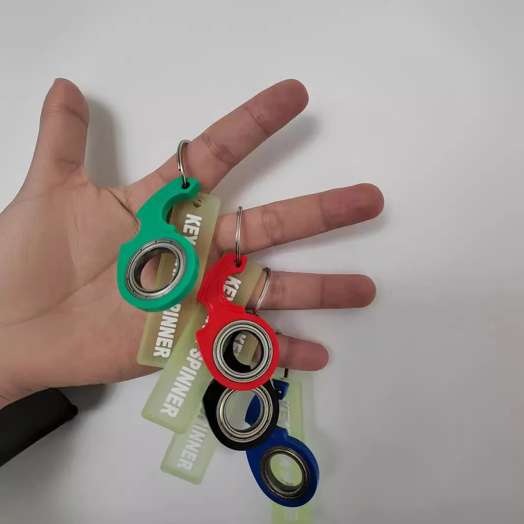 Llavero antiestrés Karambit spinner luminoso para llaves - imagen 4