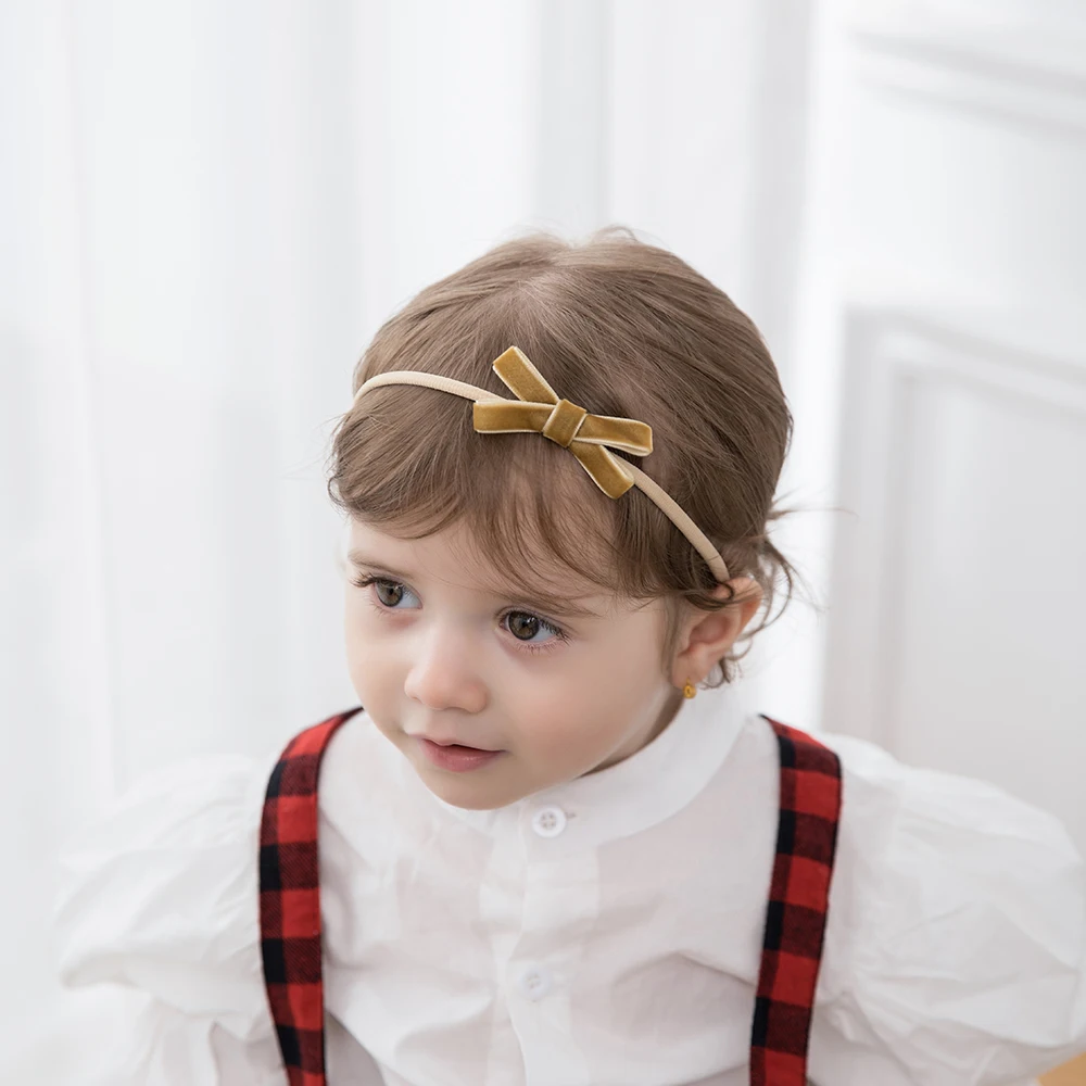 Diadema de terciopelo turquesa con lazo para bebé