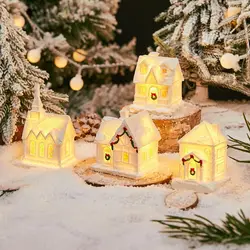Casa de Navidad luminosa de resina blanca con luz cálida