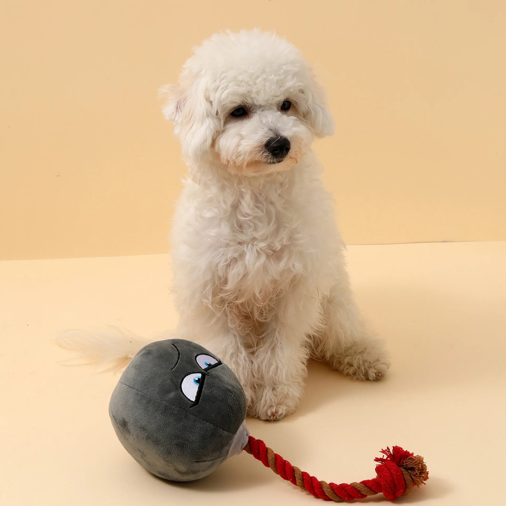 Pelota para mascotas con forma de granada para morder y jugar