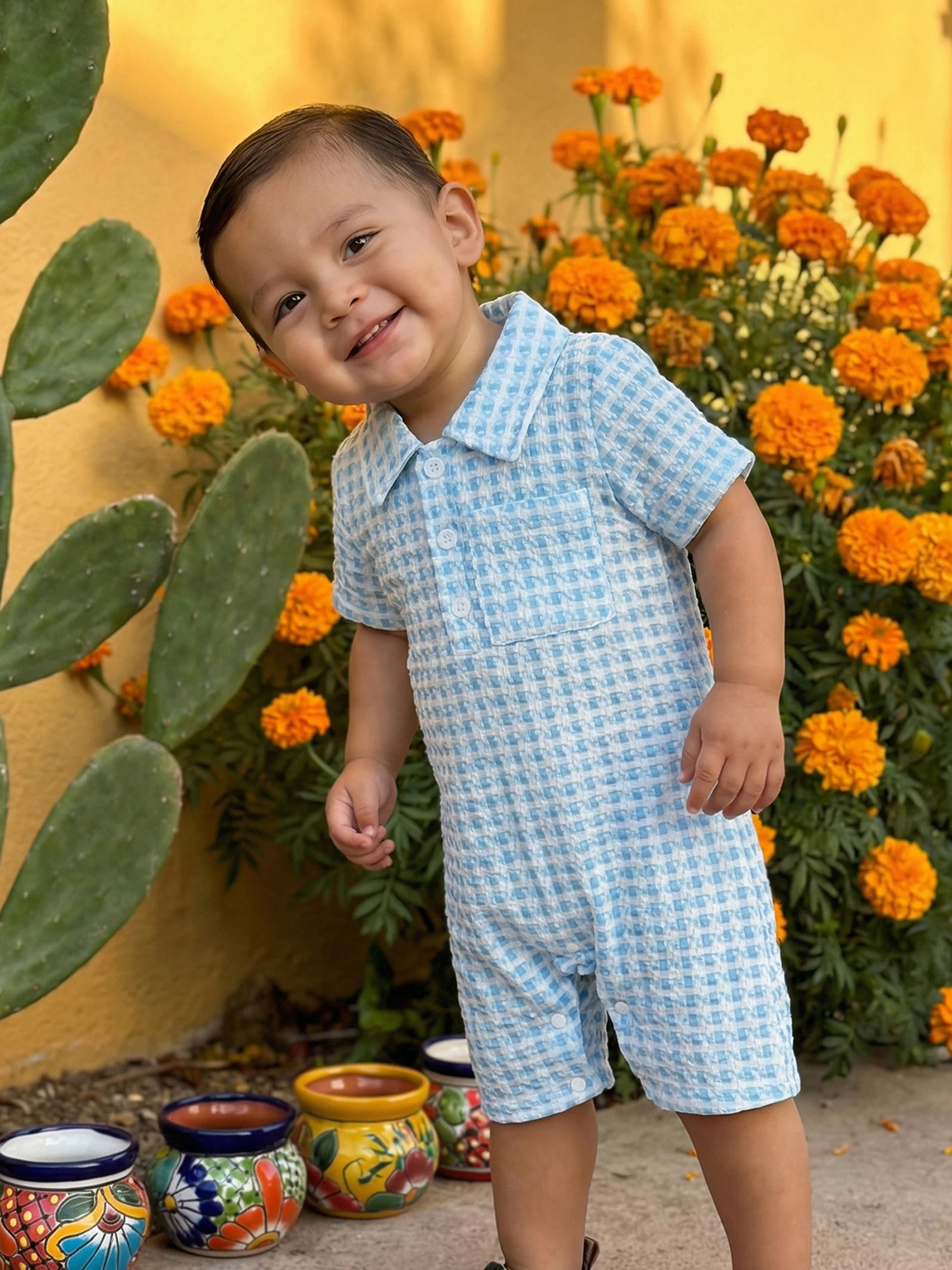 Mono con cuello y manga corta para bebé