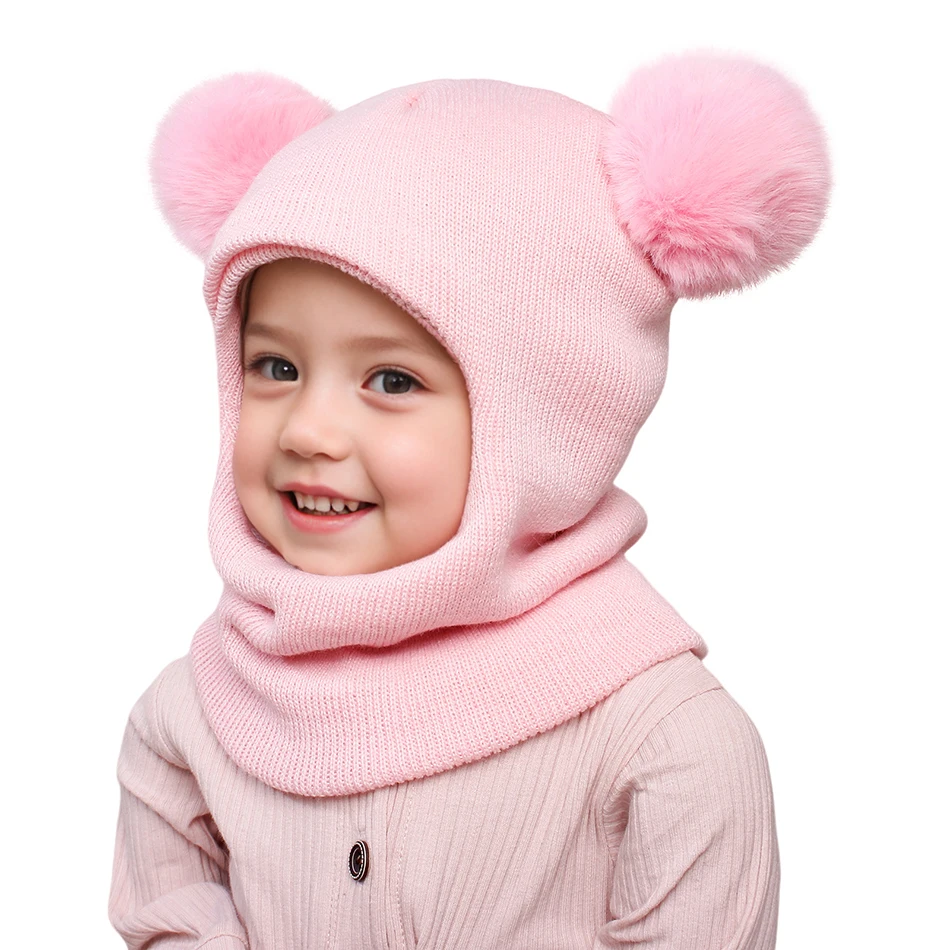Gorro de punto con dos bolas