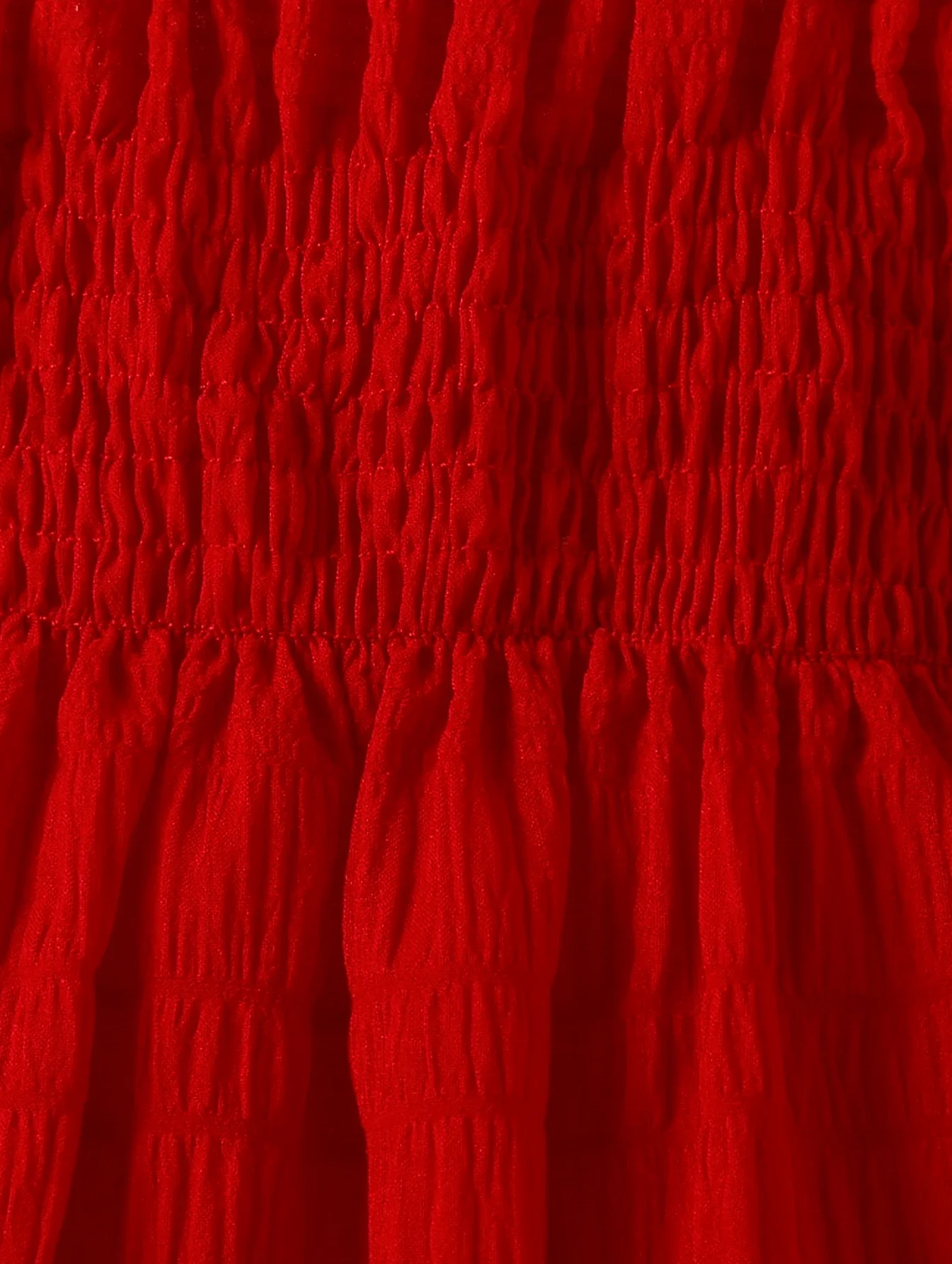 Detalle del lazo y el acabado del vestido
