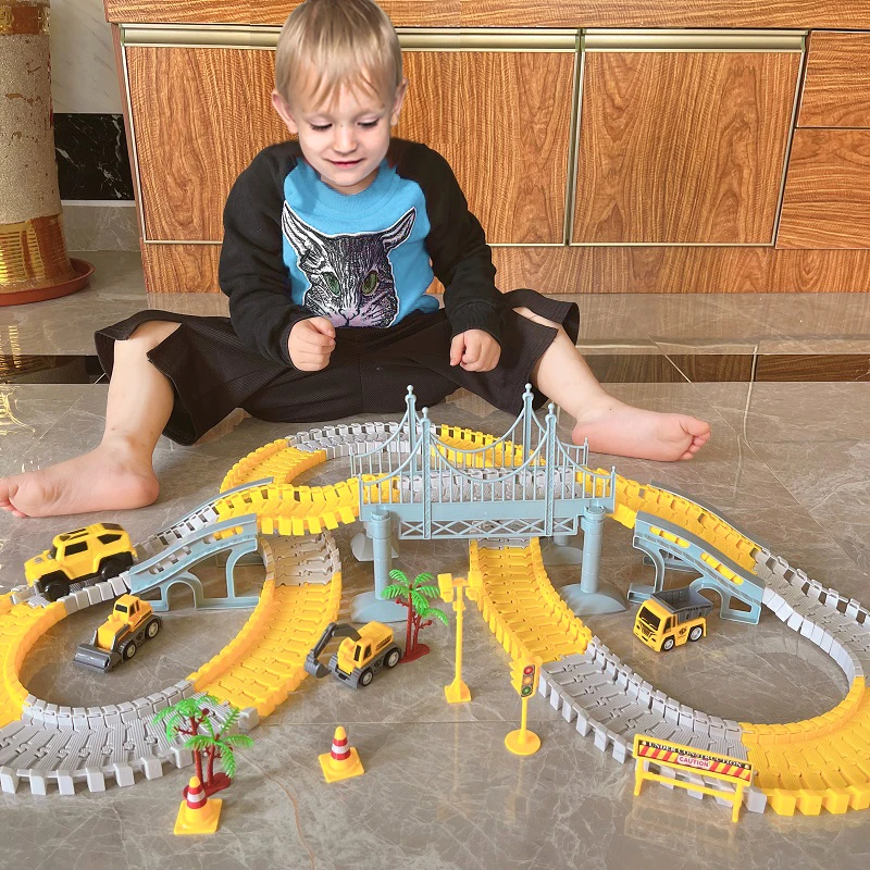 Set de construcción con vehículos eléctricos de carreras para niños