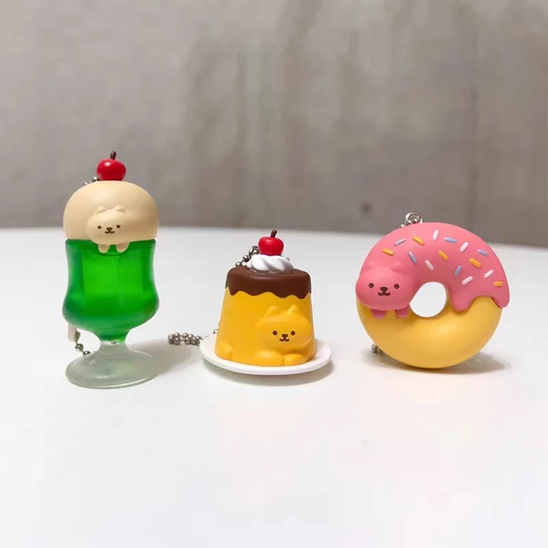 Cápsula de sorpresa con gato kawaii - Figura oculta en rosquilla - imagen 4