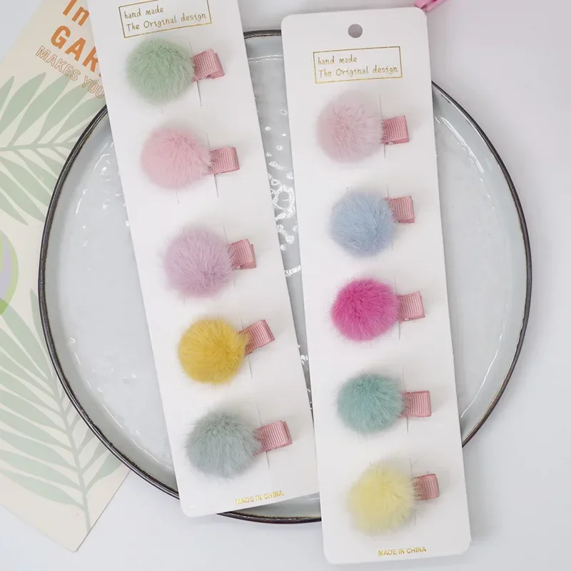 Horquillas para bebé con pompones en tonos pastel - imagen 3