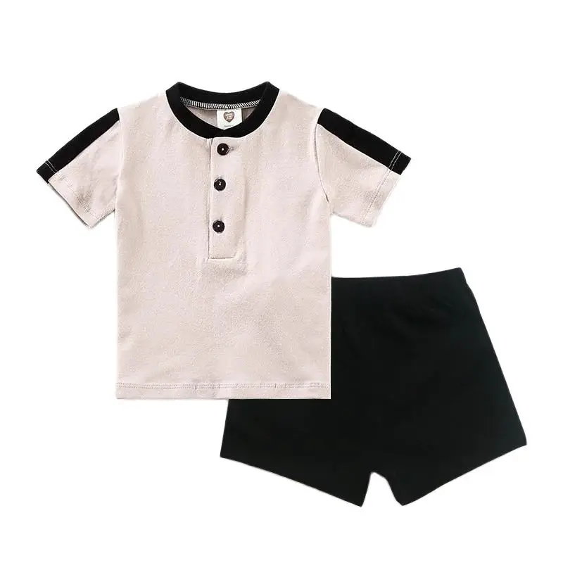 Conjunto bebé top de algodón, pantalón corto con botones y volantes - imagen 2