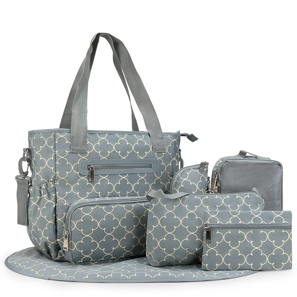Bolsa de pañales a rayas beige con accesorios a juego y bolsillos - imagen 2
