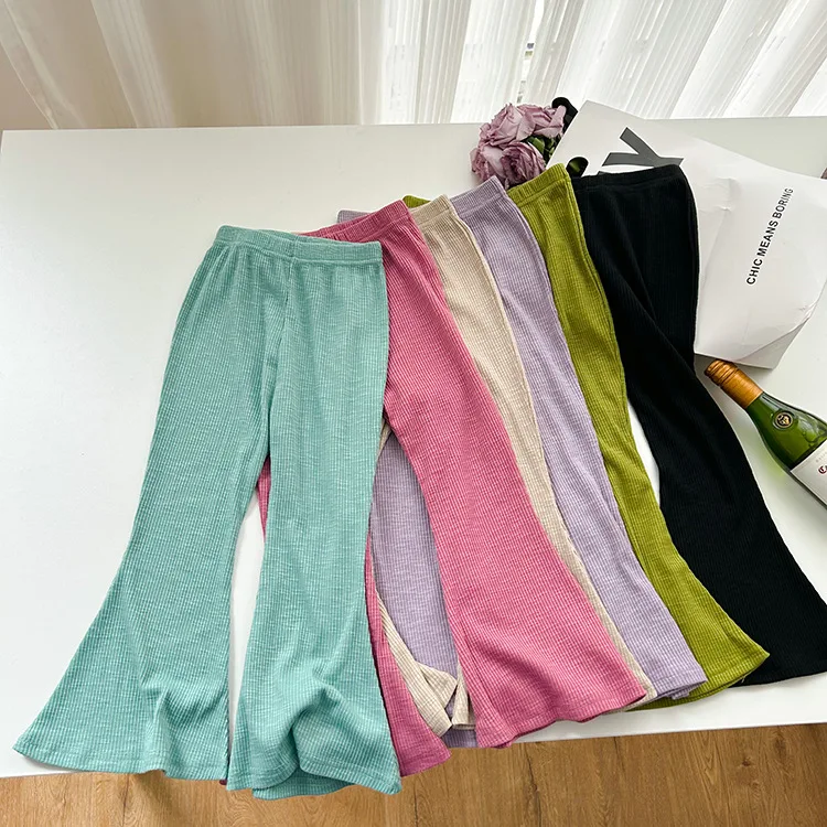 Pantalones para niños rosa y negro con rayas